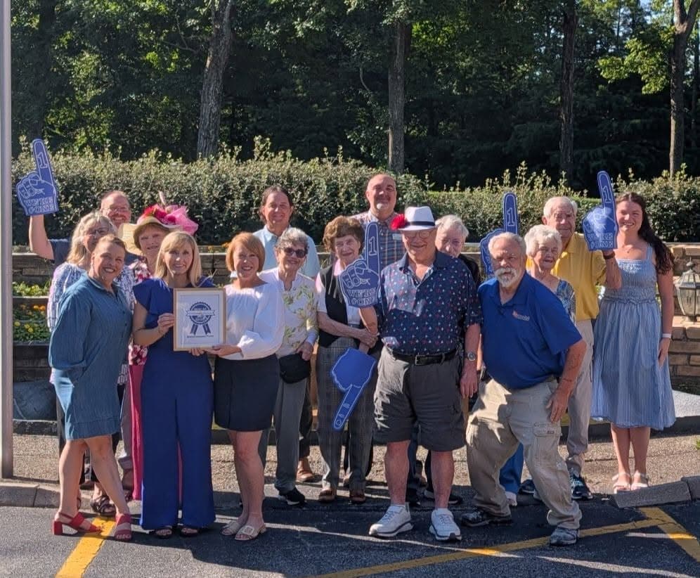 Brownsboro Park team and residents celebrating outdoors